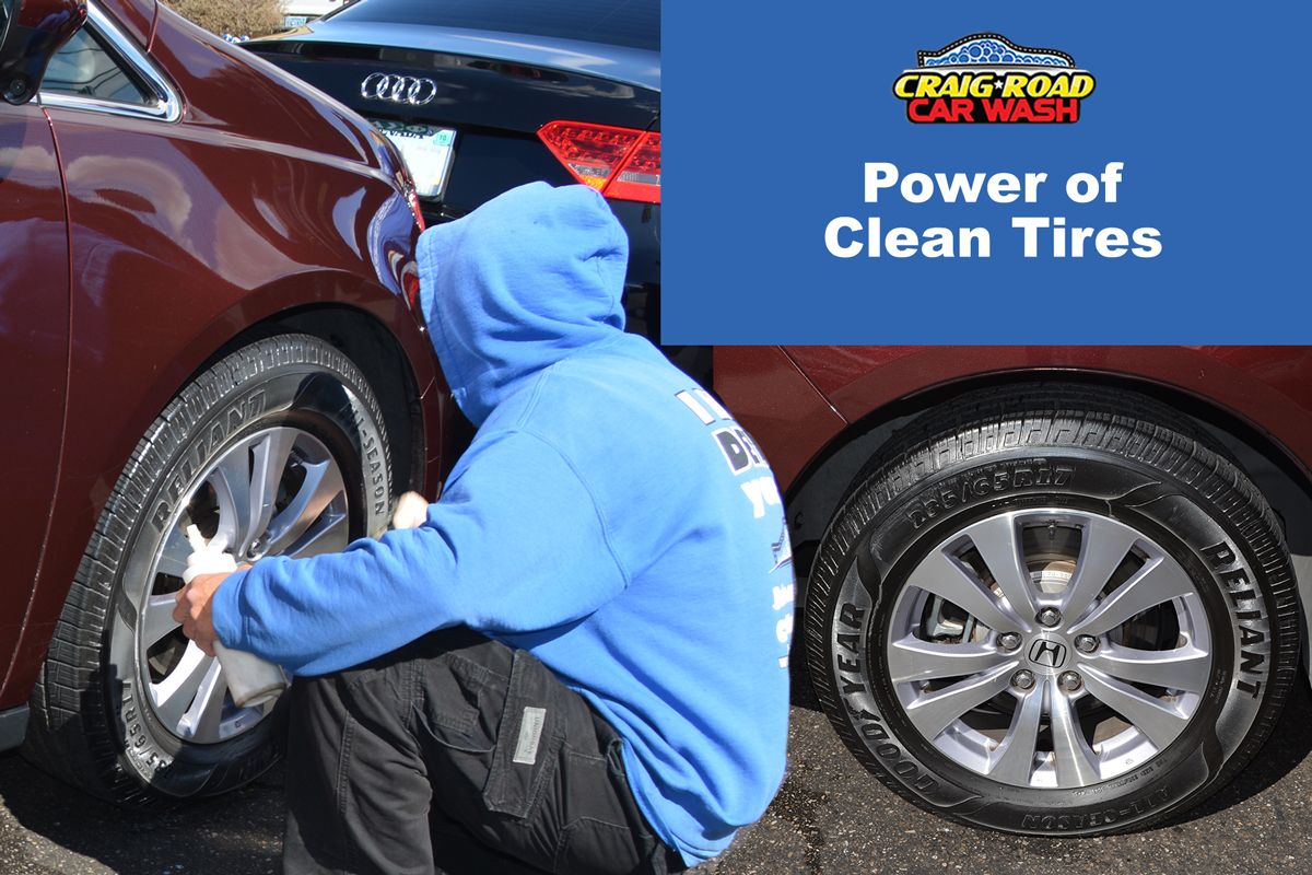 craig road car wash worker cleaning tires on red van.